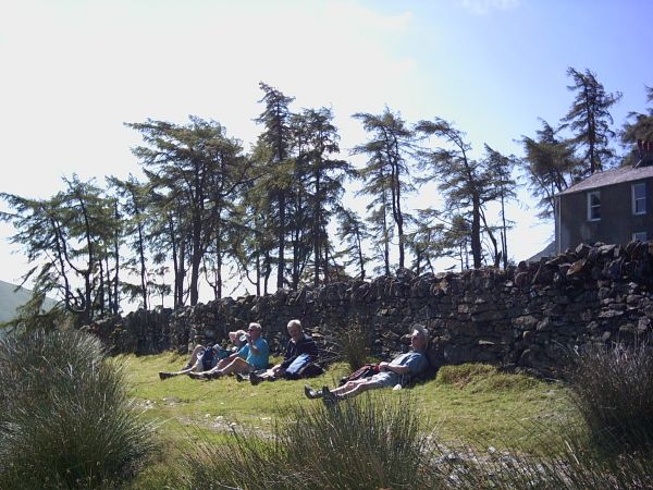 Resting on the Cumbria Way outside Skiddaw House