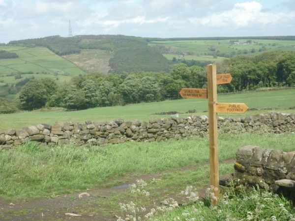 Footpath sign on Six Dales Trail