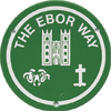 Waymark: Cross, castle and ram on green disc
