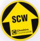 Letters SCW on black/yellow waymarks