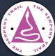 Waymark: White disc/serpent in purple triangle/encircling name
