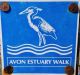 Name and heron on blue plaques