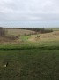 A par 3 down hill golf hole A par 3 down hill golf hole