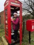 A telephone box doubling as a library. Gill just borrowing a book. How she'll return it I don't know.