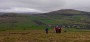 Climbing away from Uldale. The gable end of Maes Tearooms visible left of village Climbing away from Uldale. The gable end of Maes Tearooms visible left of village