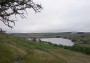 The aptly named Wet Sleddale reservoir with the cars visible in the distance