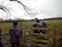 &nbsp;Through a muddy kissing gate