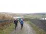 Sue and Alma striding up from Castleshaw Res' Sue and Alma striding up from Castleshaw Res'
