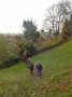 Off towards a tricky wall stile Off towards a tricky wall stile