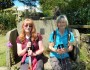 Christine and Isobel make the most of a stone seat Christine and Isobel make the most of a stone seat