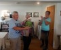 Viv presents Norman with his birthday cake Viv presents Norman with his birthday cake