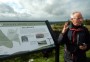 Peter at an information board Peter at an information board