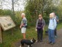 Looking at the information board Looking at the information board