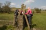 Helping the dogs over the stile