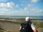 Norman with Plover Scar lighthouse in the distance Norman with Plover Scar lighthouse in the distance