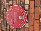 Plaque by the canal