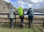 Three men and a fence
