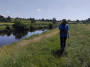 By the river