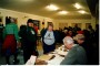 Barbara Blatchford at the 1997 check-in desk with Tony Youngs and Ann Sayer. Reg Chapman passes - by Michael Benison Barbara Blatchford at the 1997 check-in desk with Tony Youngs and Ann Sayer. Reg Chapman passes - by Michael Benison