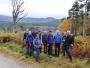  Scenic team photo with Loch Morlich and the Cairngorms in the background.