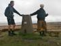  Trig point on Tame Scout - Phil looks very fetching in his'rain kilt'!