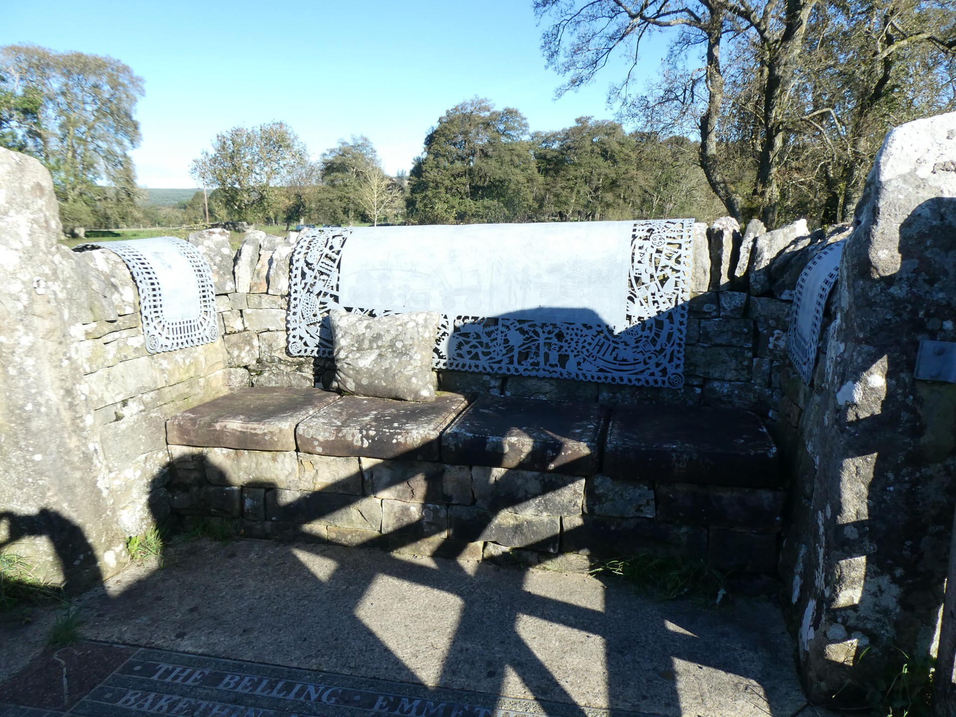 The Stell has metal seat backs over the stone seats